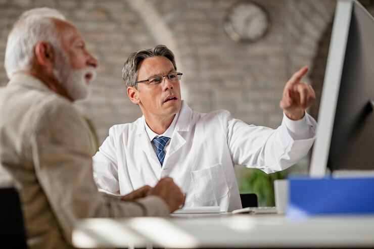 mal doctor his mature patient analyzing medical records computer consultations clinic 637285 1197