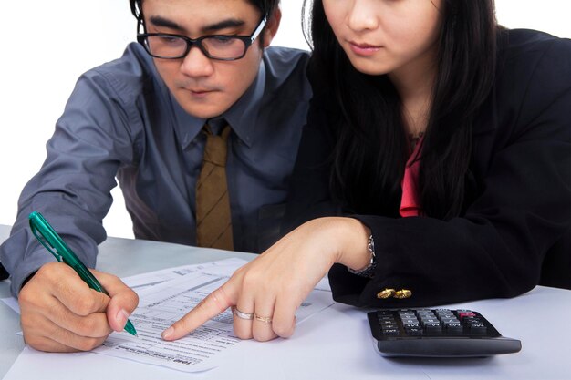 business team filling out tax form 175634 37781