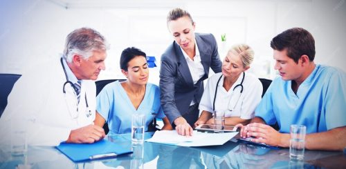 team-doctors-businesswoman-having-meeting_1134-1608